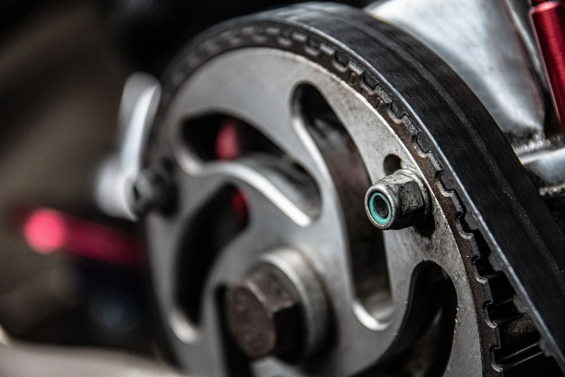 An engine timing belt and pulleys